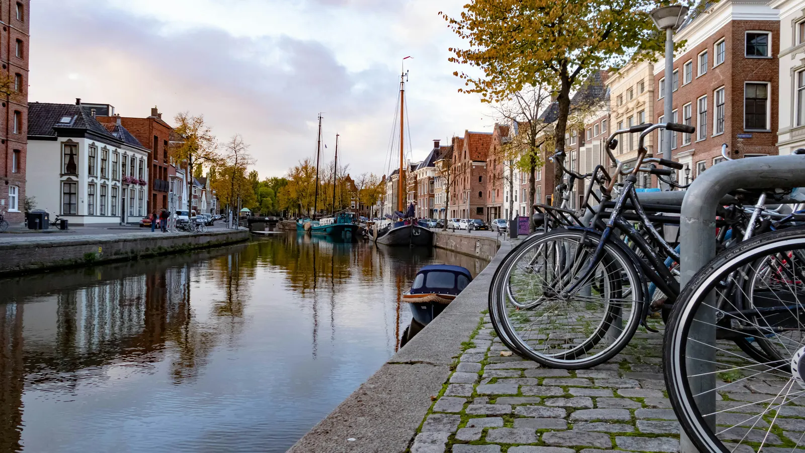 Canal in the old center of Groningen with parked bicycles